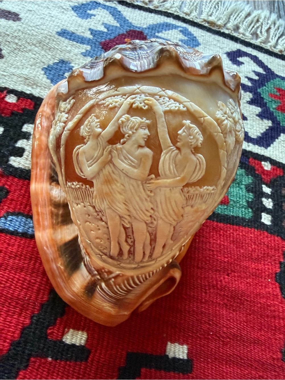 Three Graces carved conch shell